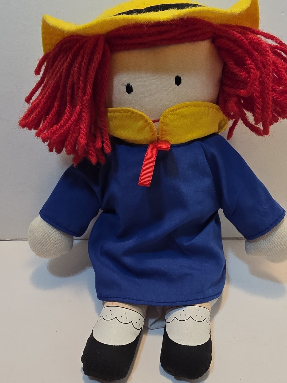 Red-Haired Doll in Blue Outfit and Yellow Hat - Kids Toy